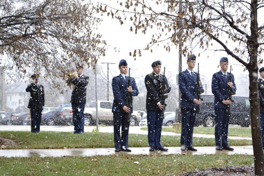 A gun salute and taps honor veterans
on Nov. 11 during a ceremony outside the Hamilton Room. 