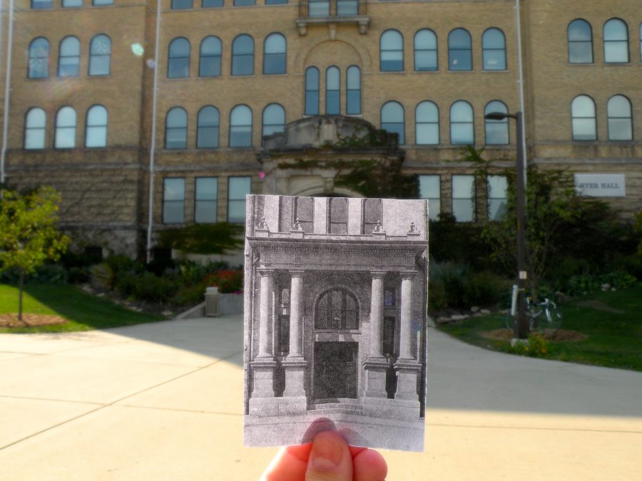 An old photo of the East Wing entrance of Old Main, now known as Hyer Hall, held up to the current building entrance. 