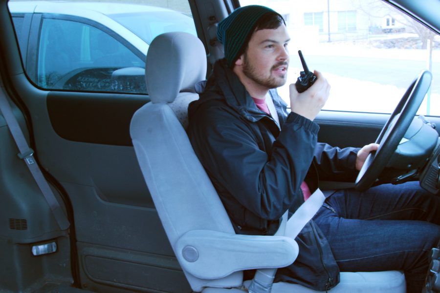 Senior Kyle Crossett talks to dispatch on the two-way radio as he gets ready to go on a pick-up.
Vesna Brajkovic photo/ BrajkoviVA04@uww.edu