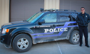 Officer Dan Kuehl posing next to a patrol van. “We are State Police Officers,” Kuehl said. “We are just like any other Police Officer, we are not security. We follow the same laws and have the same toys on our belt. The only difference is jurisdiction, and every police department has their own jurisdiction. If there is anything I’d like to clear up, it’d be that.” Amber Levenhagen Photo/ LevenhagAL14@uww.edu