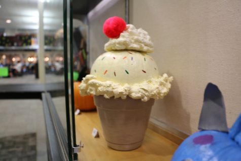 Students decorate pumpkins for prizes