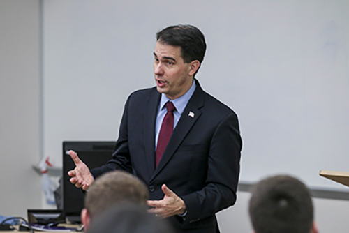 Scott Walker speaks to a full room of students to kick of the first UW College Republicans meeting of the spring semester. Walker focused on economic issues that face college students as well as Wisconsin.