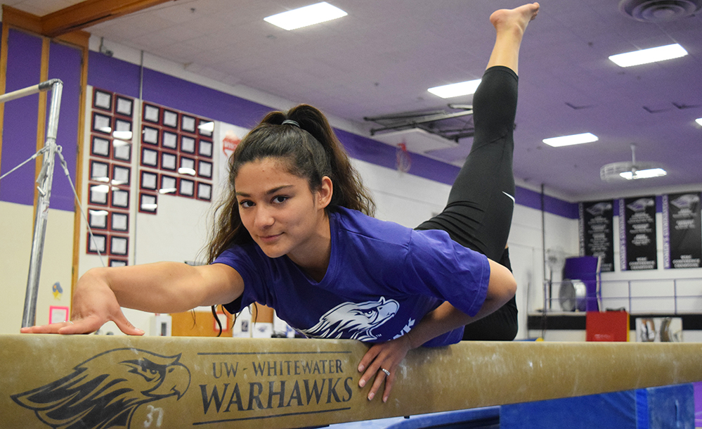 Sophomore Lisa ODonnell poses on the balance beam after winning the Royal Purple Female Athlete of the Year. Photo by Hannah Jewell
