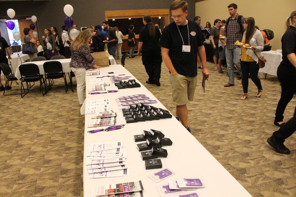 Nontraditional student Kyle Grotenhuis checks out a display at the sixth annual Adult Student Welcome Event. 