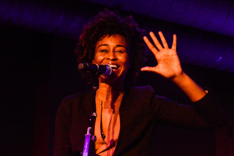 Poet Kyla Lacey performs her work on Feb. 22 at the Down Under in the University Center.
