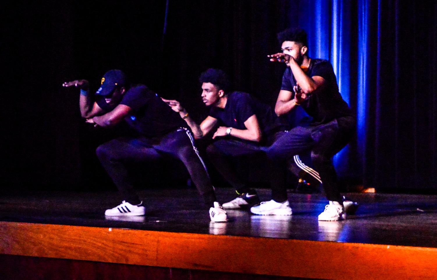 Students of Alpha Phi Alpha fraternity show pride for their Greek organizations at an annual talent show during Greek Week on Feb. 22 in the University Center Hamilton Room.