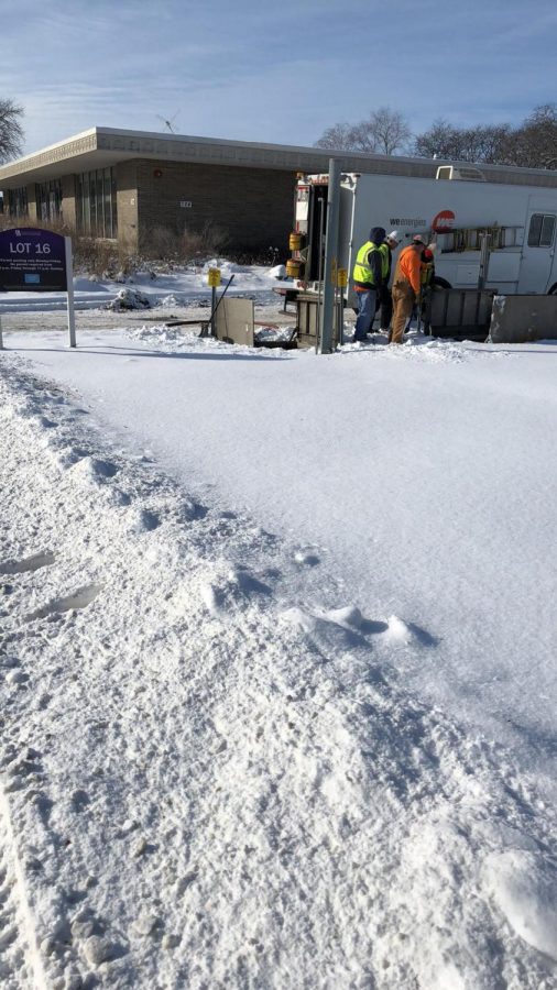 Crews from WE Energies survey the scene of a gas leak as they work to fix the issue Tuesday, Feb. 6.