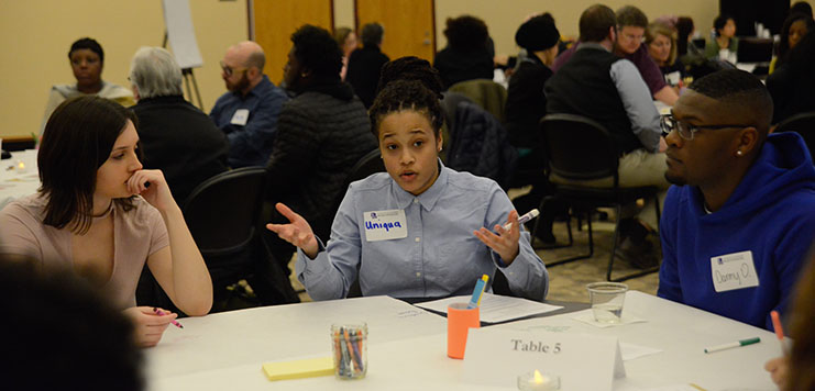Freshman Uniqua Woodson talks with fellow students about what the University of Wisconsin - Whitewater can do to improve diversity and foster an inviting environment on campus at “Shaping Our Future Through Civil Dialogue.