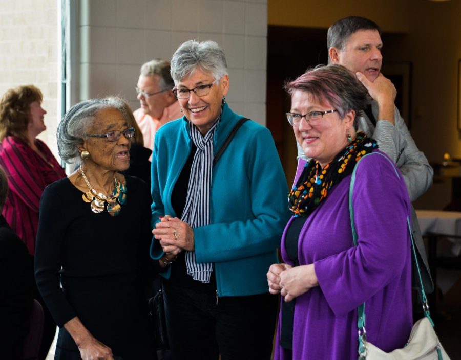 Fannie Hicklin is greeted by friends, former students and UW-Whitewater faculty Oct. 14. in Fern Young Terrace. She is pictured talking with retired faculty member Robin Pettersen and Anna DeWind Walls.