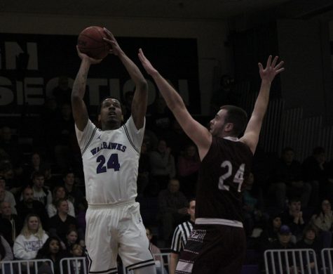 Brown Jr. sets record, Warhawks split week