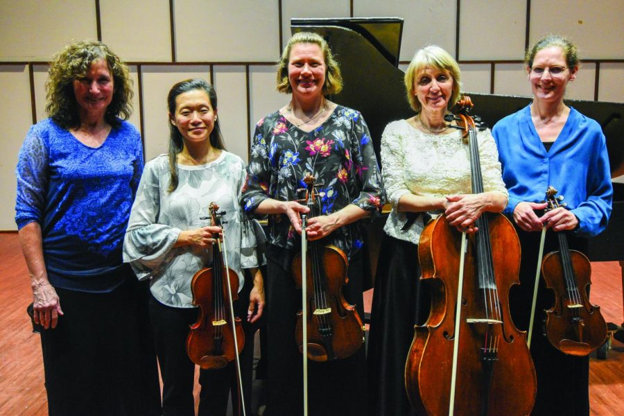 Members of the Illinois Chamber Music faculty posing with their instruments.