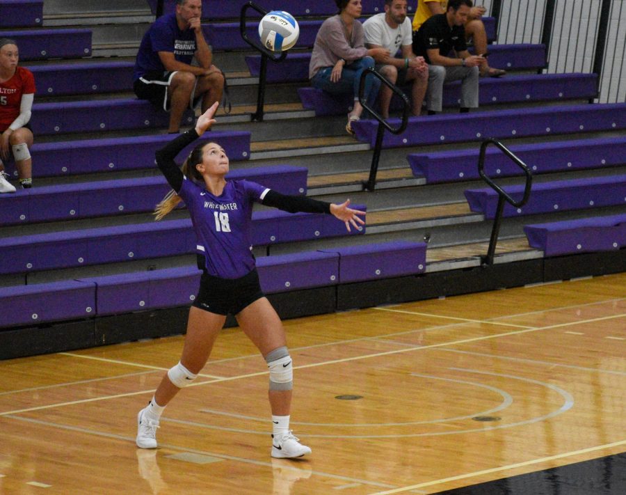 Hailey+Mackenthun+serves+the+ball+during+the+Wednesday%2C+Sept.+4+game+where+the+Warhawks+triumphed+against+the+Carthage+college+with+a+score+of+3+to+1.