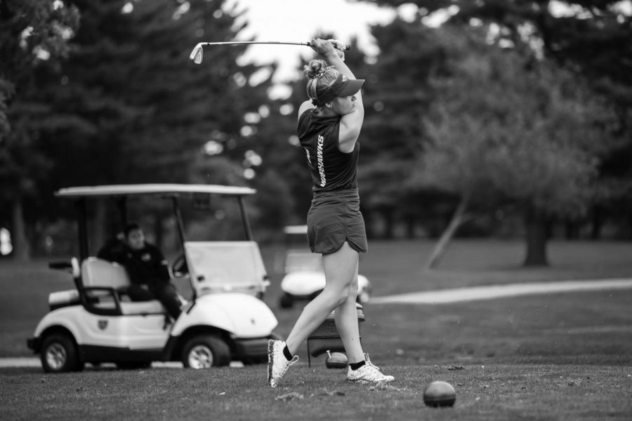 Freshmen+Jessica+Laberge+hits+a+stroke+at+Riverside+Golf+Course+on+Saturday+September+21.+She+shot+100+and+99+to+finish+at+199.