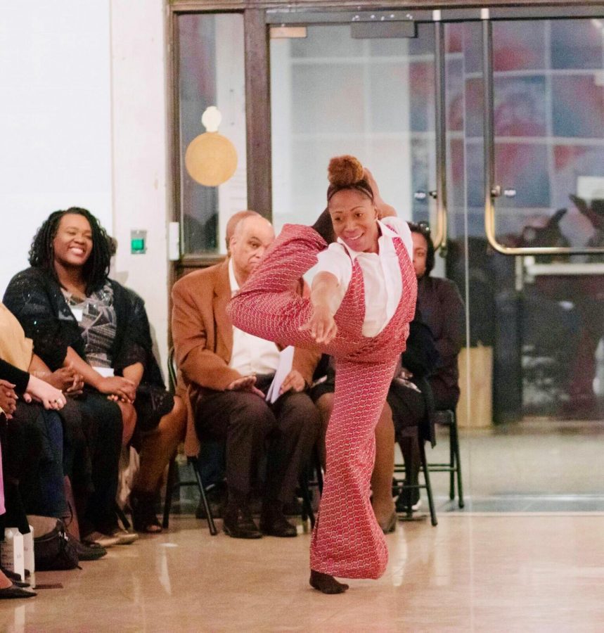 A performer entertains the audience in attendance with her contemporary dance routine.