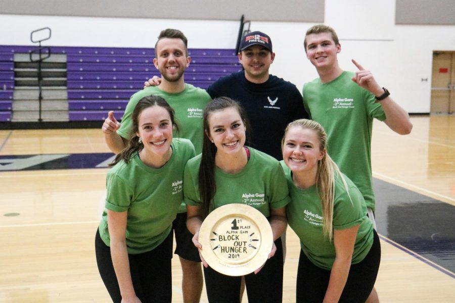 Alpha Gamma Delta’s 2nd Annual Block Out Hunger volleyball tournament first place team poses for a championship photo.