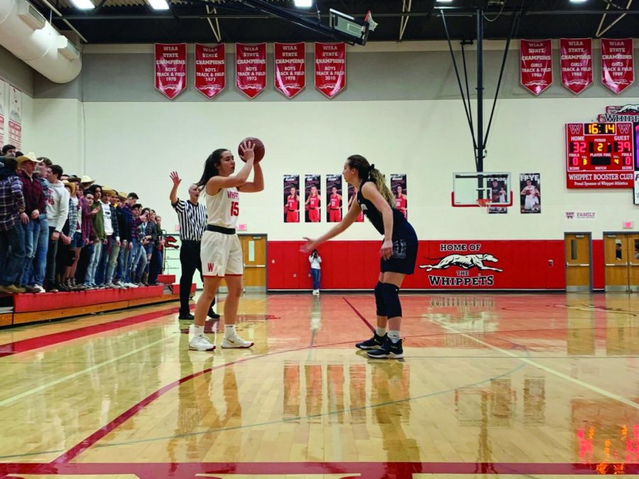 Junior Kacie Carollo runs the offense against Clinton on Feb. 20. She scored 22 points to lead her team during the loss. 