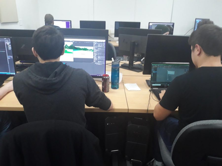 Students Nikkos Horaitis and Lance Pearson jamming at Global Game Jam.