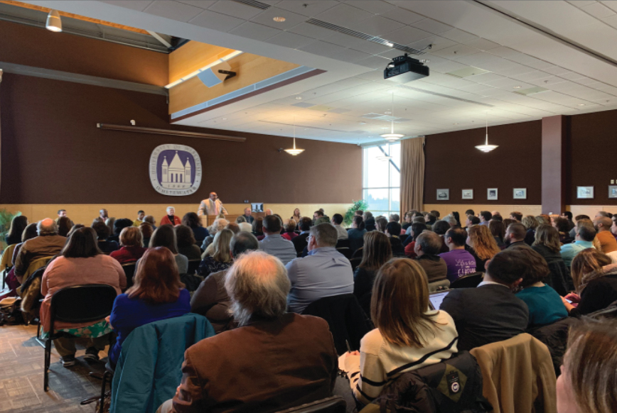 Faculty+and+students+observe+Chancellor+Watsons+listening+session+for+commentary+pertaining+to+the+UW-W+budget+changes.