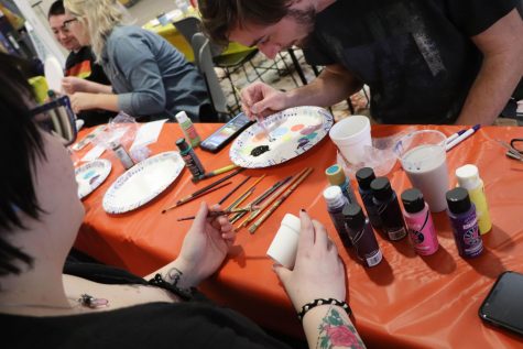 Students go green painting planter pots