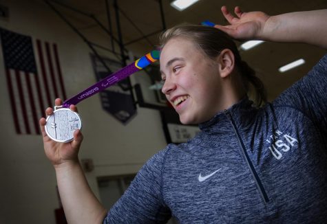 UW-Whitewater women's wheelchair basketball player Lindsey Zurbrugg is shown with the silver medal she received as a member of Team USA at the Parapan American Games in Lima, Peru, in August 2019. She will play as a Warhawk in 2019-20 and hopes to qualify again for Team USA ahead of the 2020 Paralympic Games in Tokyo.