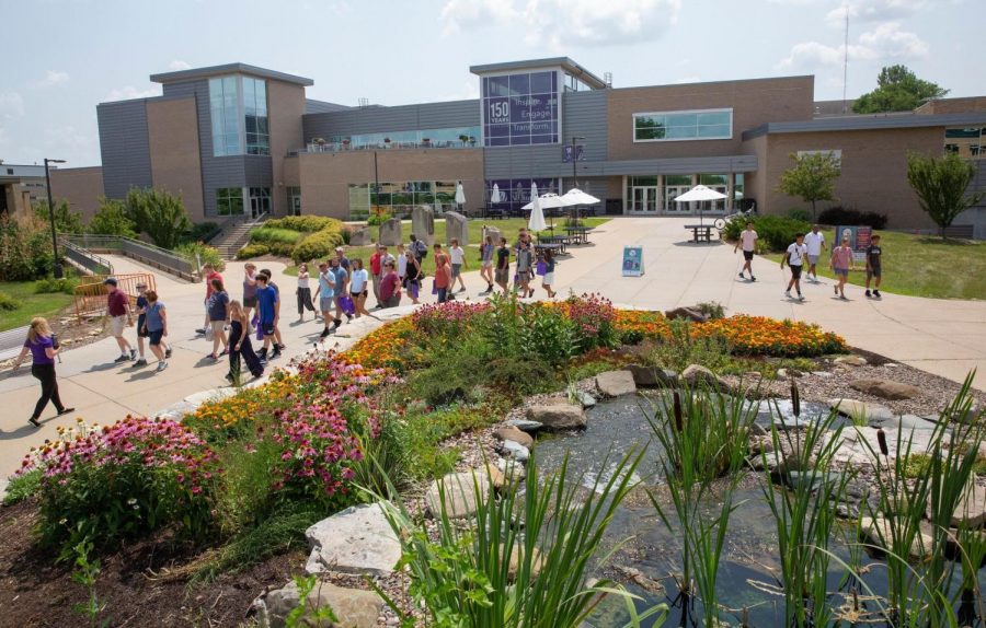 Students traverse the courtyard outside the James R. Connor University Center. 