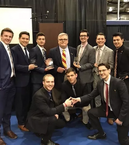 The UW-W Delta Chi Fraternity poses for a picture with their 2020 Region V Chapter Awards.