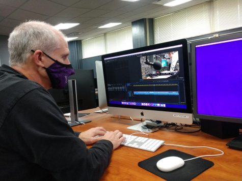 UWW-TV program manager Jim Mead adds closed captioning to a video clip for the hearing impaired.