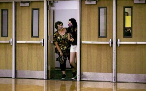 Kylie McCombe, right, and her aunt, Jenny McCombe, look into Kachel Gym during a tour of the Williams Center. UW-Whitewater admissions staff visited with incoming and prospective students and their families and guided small tour groups around campus on Thursday, July 16, 2020. (UW-Whitewater photo/Craig Schreiner)