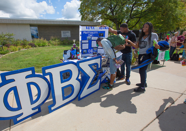 Giant letters can't be missed at the Phi Beta Sigma table.  Student organizations, clubs, fraternities and sororities showcase their activities at the annual Involvement Fair on the mall at UW-Whitewater on Wednesday, September 14, 2016.  (UW-Whitewater photo/Craig Schreiner) DIGITAL MANIPULATION OF PHOTOGRAPHS OTHER THAN NORMAL MINIMAL CROPPING AND TONING IS PROHIBITED., CREDIT PHOTOS: UW-WHITEWATER PHOTO/CRAIG SCHREINER