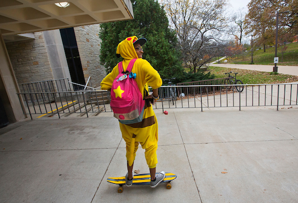 Dressed as the Pokemon character Pikachu, UW-Whitewater junior Jasmine Gilling sets out on her longboard from Anderson Library on October 31, 2017.  Jasmine said Halloween is the perfect day to enjoy her love of costumes. (UW-Whitewater photo/Craig Schreiner)

DIGITAL MANIPULATION OF PHOTOGRAPHS OTHER THAN NORMAL MINIMAL CROPPING AND TONING  IS PROHIBITED., CREDIT PHOTOS:  UW-WHITEWATER PHOTO/CRAIG SCHREINER