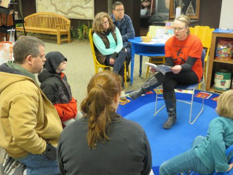 It was storytime, and Shannon Dozoryst read Louie’s book out loud. When Dozoryst spoke, the community curiously listened, and were eager to learn. - photo courtesy of Young Auditorium