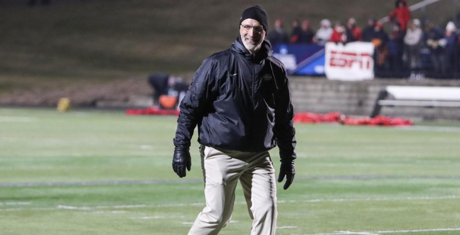 Head Coach of the UW-Whitewater football team Kevin Bullis walks off the field smiling, after the Warhawks defeated St. John’s (MINN.) to advance to the 2019 Division III Football National Championship.

