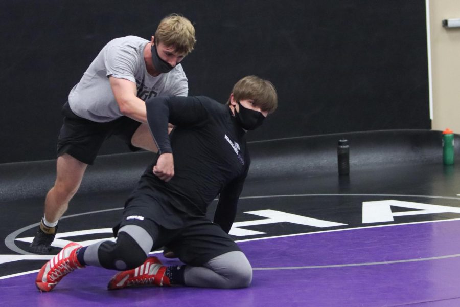 UW-Whitewater+wrestling+team+members+Jerred+Grell+%28left%29+and+Ryan+Vedner+participate+in+a%0Awarm-up+drill+during+a+team+practice+inside+the+Myers+Family+Wrestling+Gymnasium+Nov.+13.