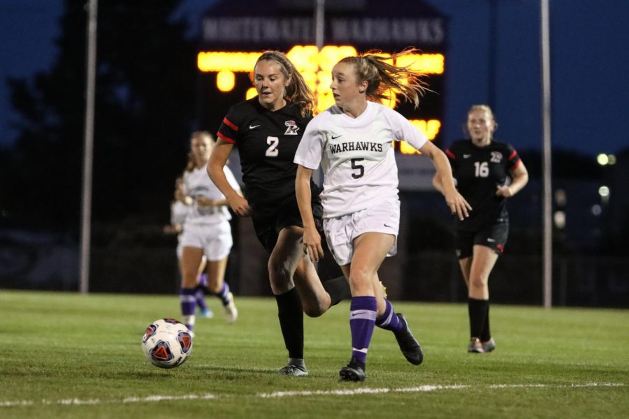 Member of the UW-Whitewater women’s soccer team Anna Boyd #5 goes for the ball during a
match against Ripon, at Fiskum Field in Sept, 2019.