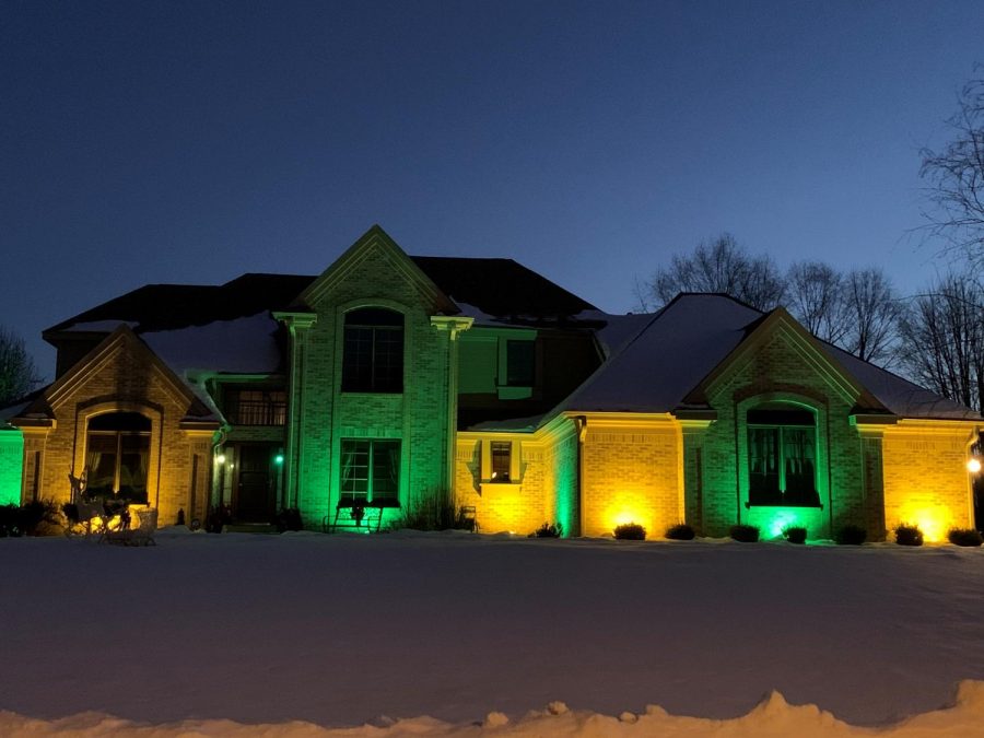 Joe and Janis Kluck show their Packer pride with green and gold lights shining at their Whitewater home on Mound View Place.