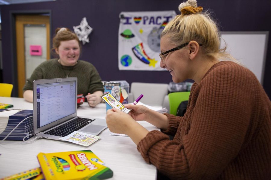 Students Alex Koon and Ash Anderson make Valentines in the PB Poorman Pride Center. 