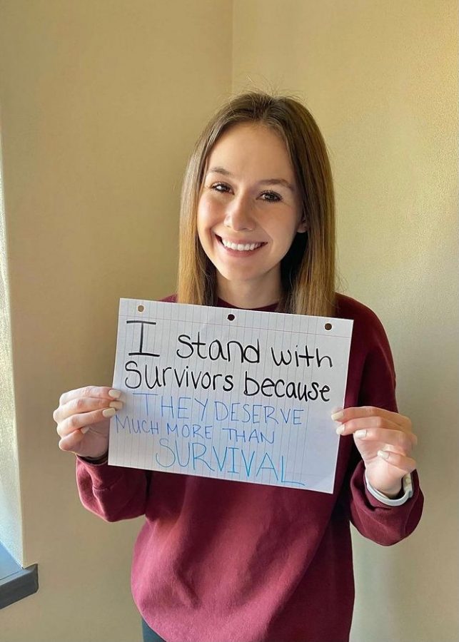 UWWCASIV showing awareness for Domestic Violence Awareness Month with social media campaign #StandWithSurivors.  Shown above is UWW CASIV Treasurer Vanessa Wleizien.