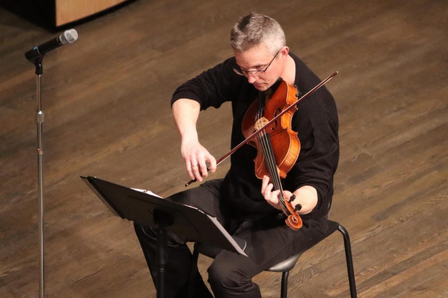 Pecatonica String Quartet musician Christopher Dozoryst plays the viola during the groups
performance inside Young Auditorium.