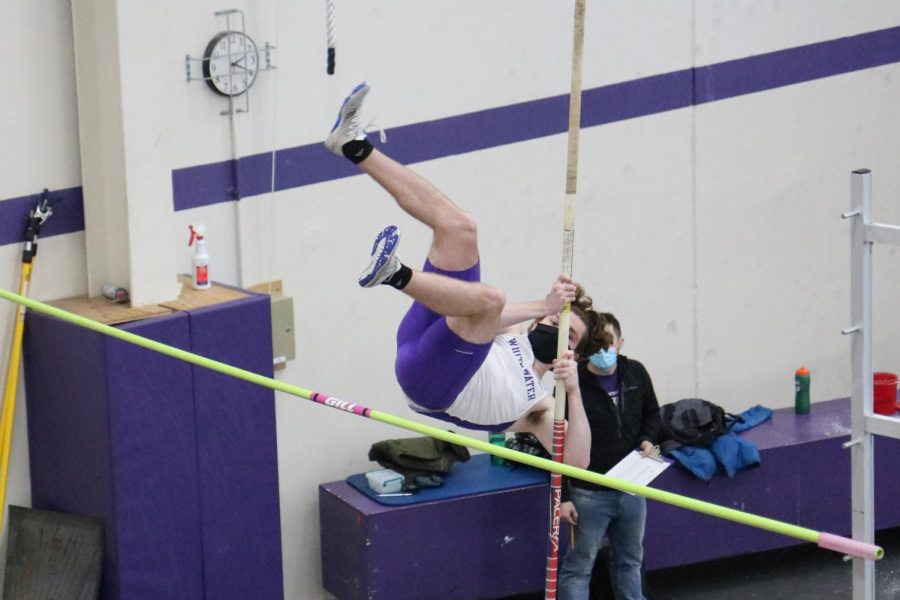 Freshman Jack Mcginn competes in the pole vault during the Warhawks track & field meet
against UW-Oshkosh.