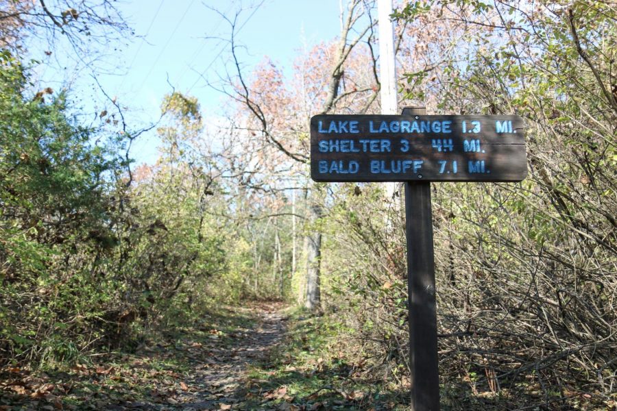 A distance marker sign located along the path of the south Kettle Moraine section of the Ice Age
National Scenic Trail.