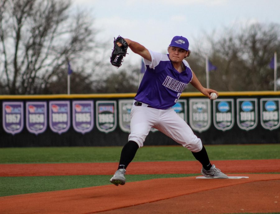 During the first game of the doubleheader against UW-Oshkosh, Freshmen Pitcher Donovan Brandl (34) throws the ball to home plate, Friday April 9.