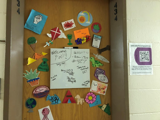 Scott Nadolinskis door decor includes a white board for friends to leave fun messages in Tutt Hall. 