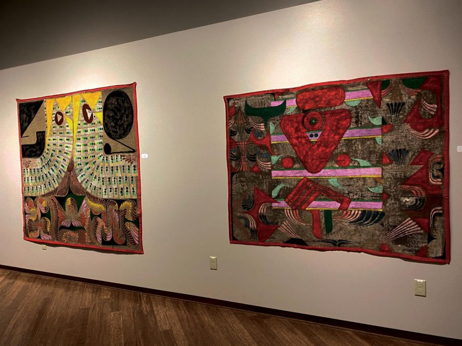 Midwestern American painter Guzza Pinc displays Huevos (left) and Appearance (right) at Roberta’s Art Gallery in the University Center.