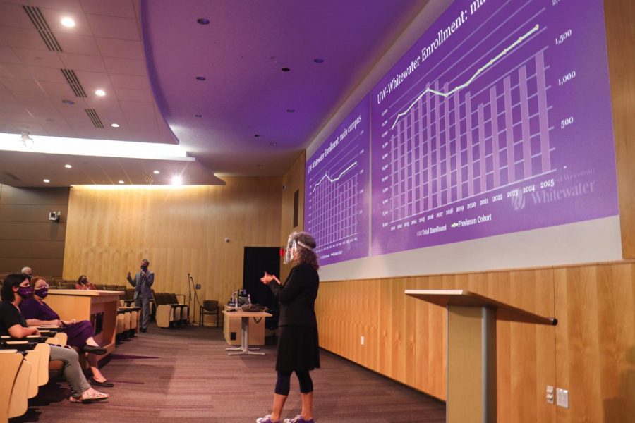 Senior student services specialist Jodi Ratcliff interprets as Provost John Chenoweth explains the projected number of enrolled students this year at the Academic Affairs Fall Forum Tuesday, Aug. 24.