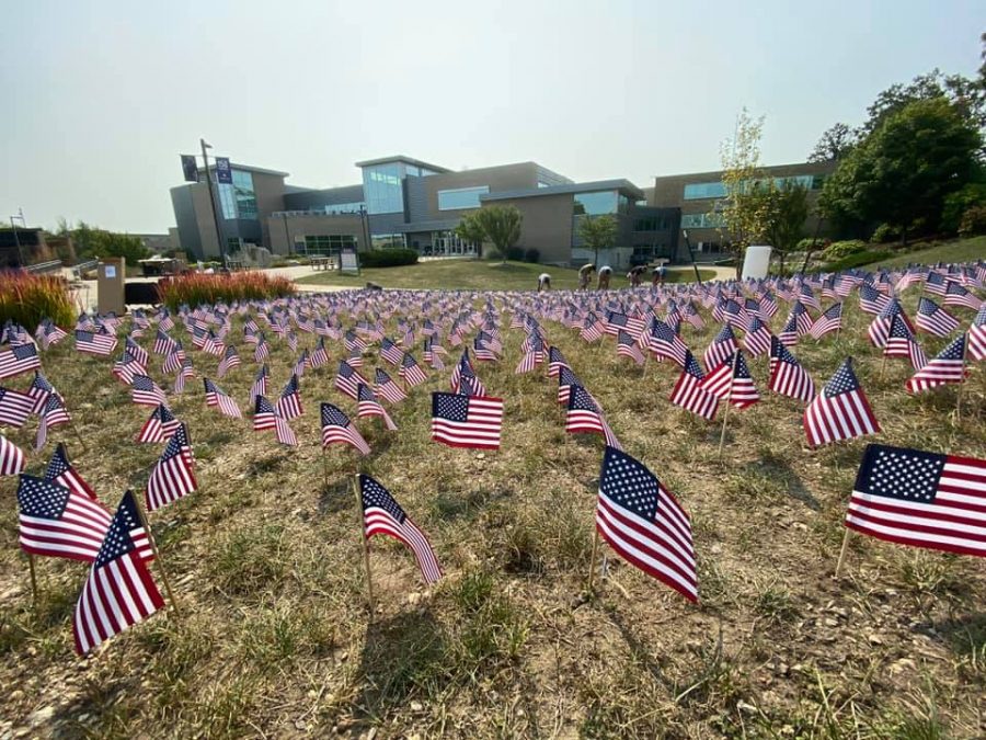 On the morning of Saturday, Sept. 11 members of the College Republicans set up 2,977 small American flags on the lawn north of the University Center to commemorate the lives of the Americans who died 20 years ago in the terrorist attacks Sept., 11 2001.