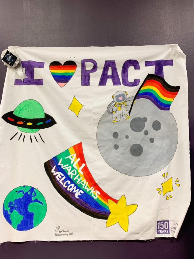 Impact, a LGBTQ+ organization on campus displays this banner in the PB Poorman Pride Center filled with art from current students showcasing the accepting atmosphere Impact creates. 
