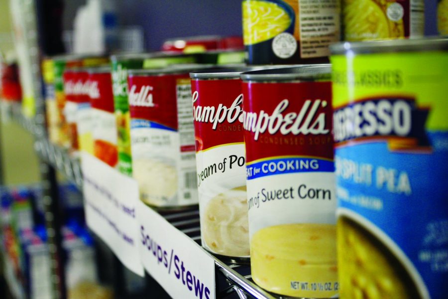 Different Campbell’s cans line a shelf at the Warhawk Food Pantry in Drumlin Hall on Oct. 20, 2021.