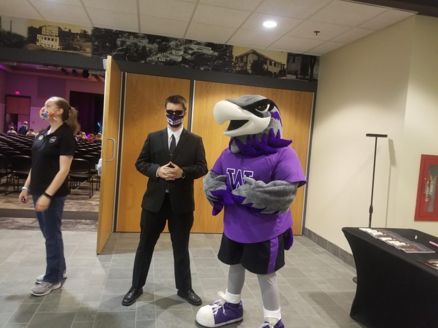 Willie the Warhalk poses next to security Guard Justin Wesolek, who is there to “look for all forms of life forms be it living, dead, zombies or aliens not of this world.”