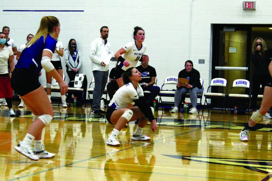 Senior defense specialist Hailey Mackenthun digs the ball up from a kill attempt by UW-Stevens Point on Nov. 4, 2021 in the Williams Center.