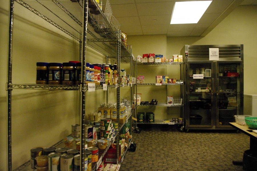 Set on shelves, refrigerators, and a freezer are food items that are there for any student in need of them. 11/30/21. 